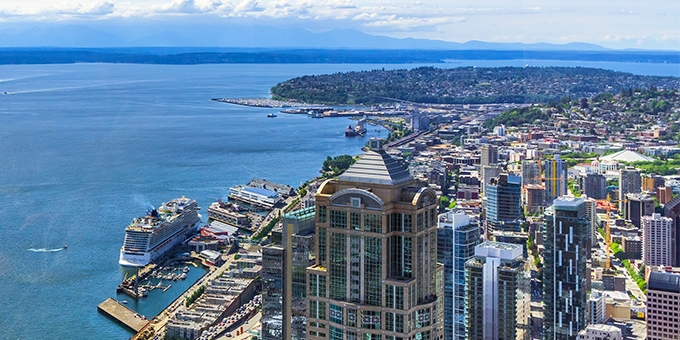 Aerial view of downtown Seattle, the waterfront, and Elliott Bay.