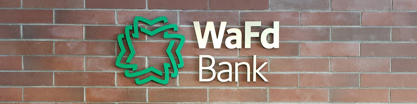 WaFd Bank sign on a brick wall