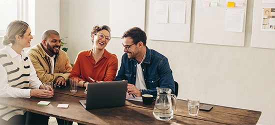 Coworkers sitting at a conference table