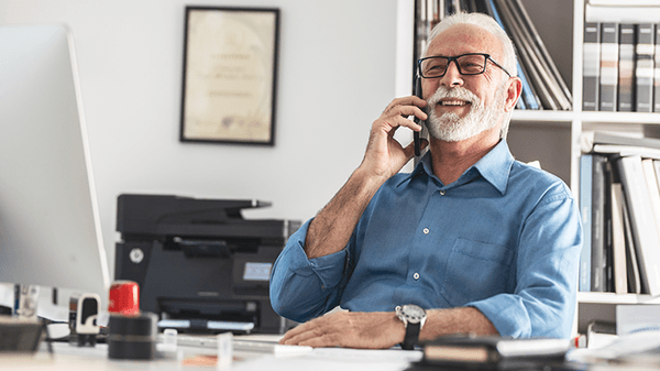 Senior businessman on mobile phone