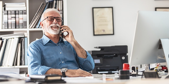 Senior businessman on mobile phone